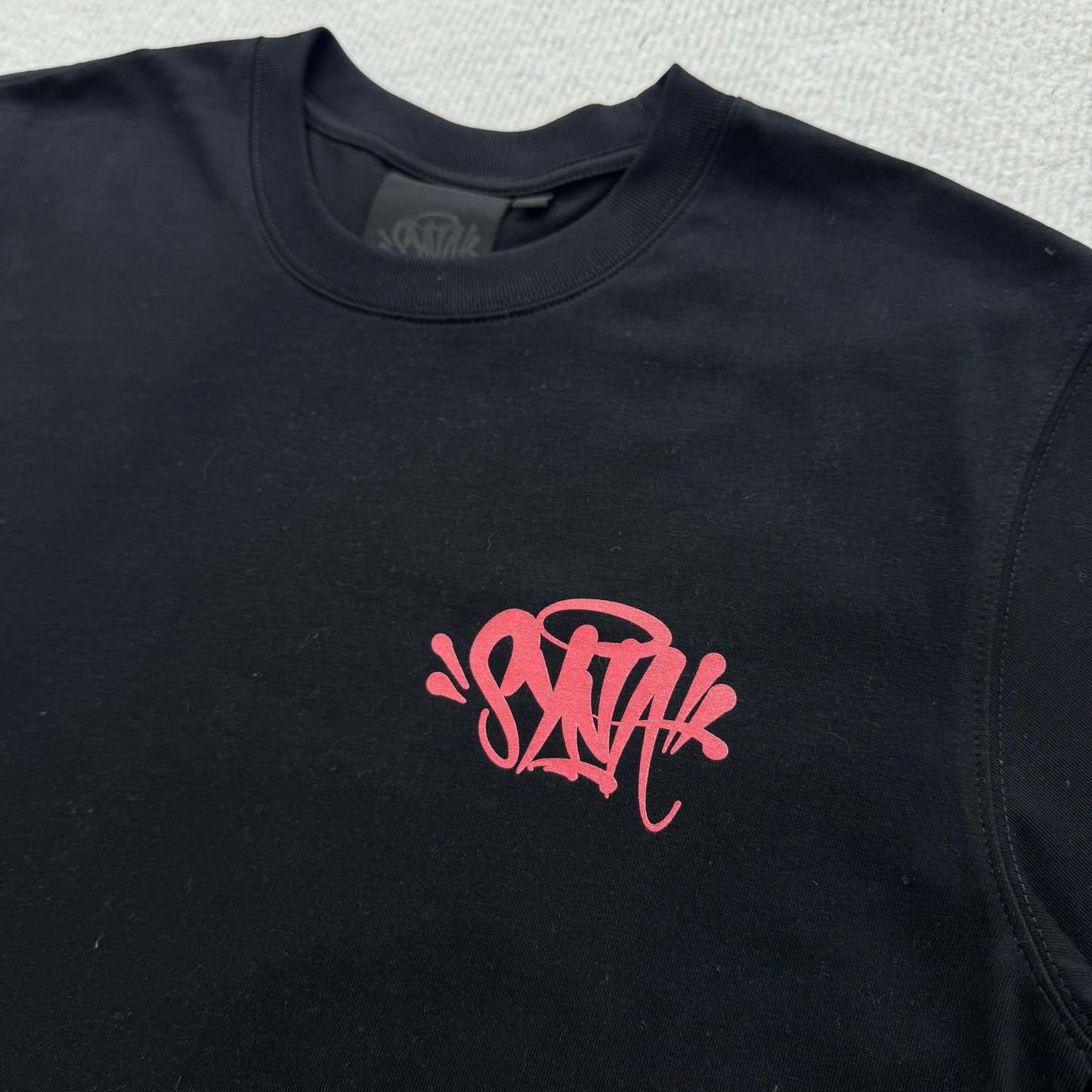 Syna World T-shirt