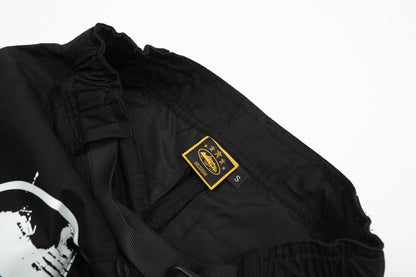 Calça Corteiz Guerillaz Cargo